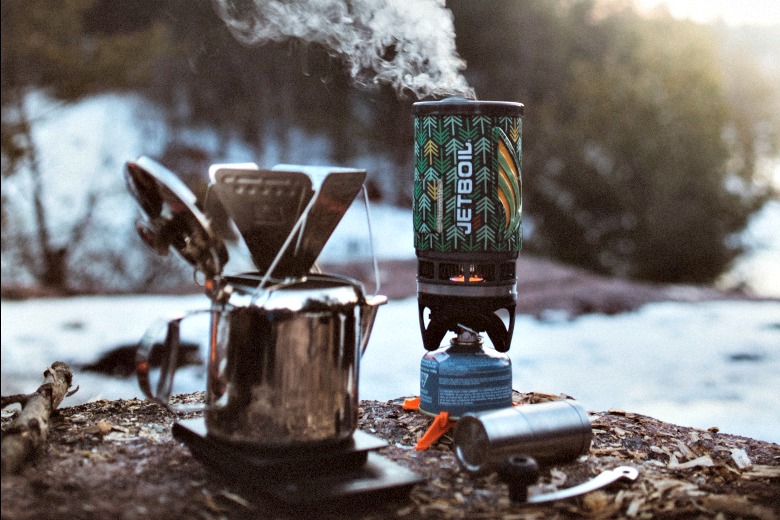 Set up a camping coffee station for a streamlined process in the morning