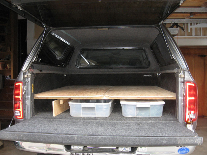 Camping in a 2025 pickup truck bed