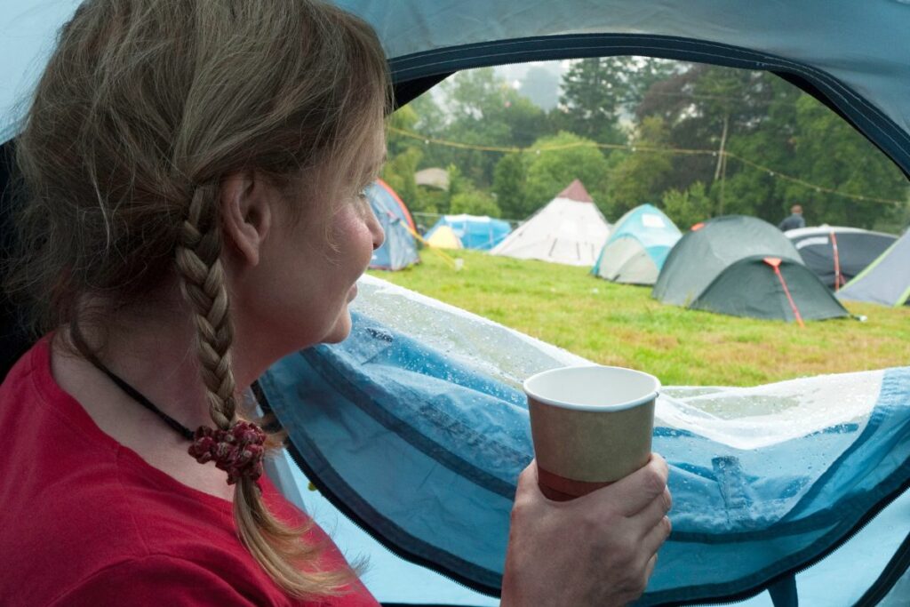 embracing the experience of camping in the rain